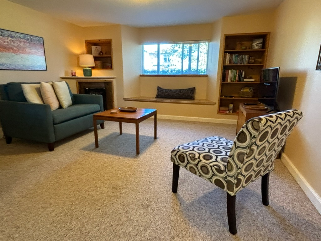 Pine-Suite Window seat and built-in shelves in living room